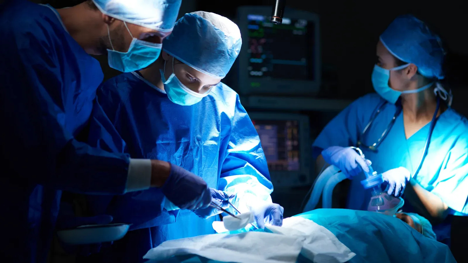 doctors doing operation in operation theatre