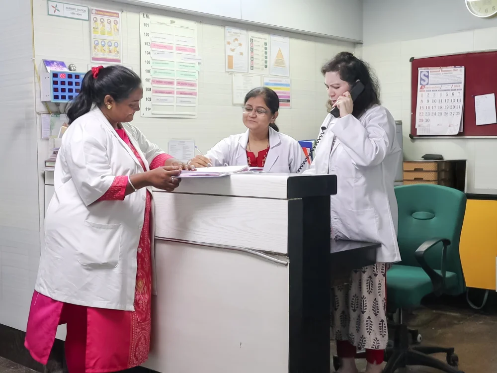 Nurses discussing about patient